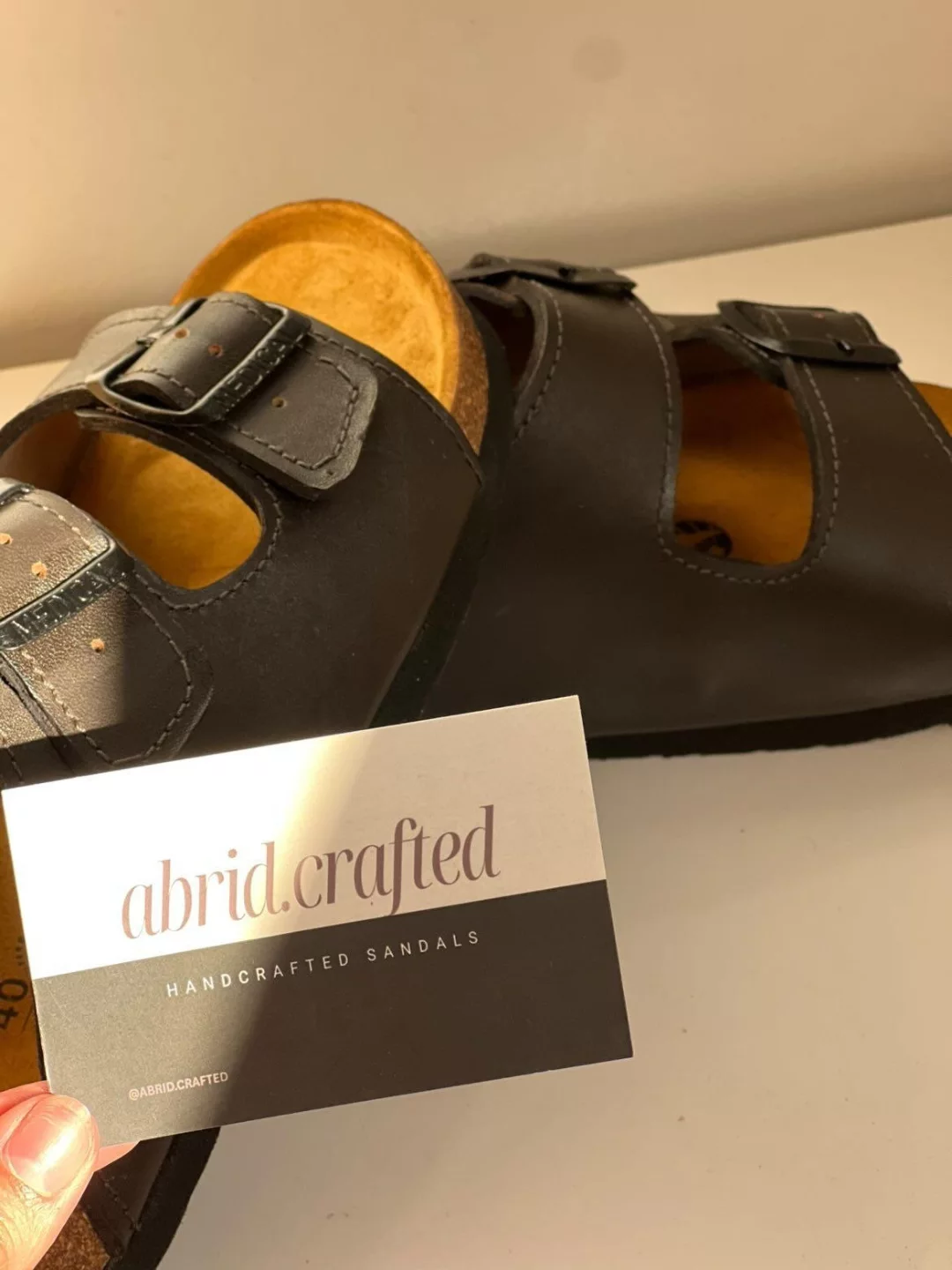 ABRID business card with the Classic sandals